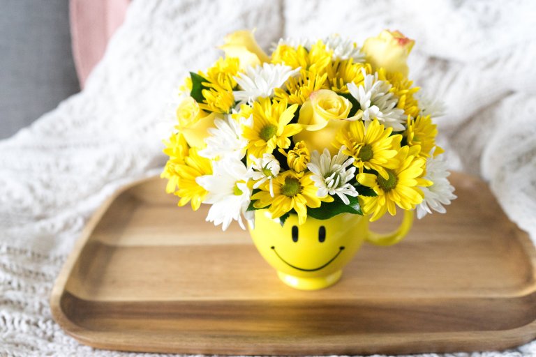 Yellow and White Flowers in Smiley Face Mug