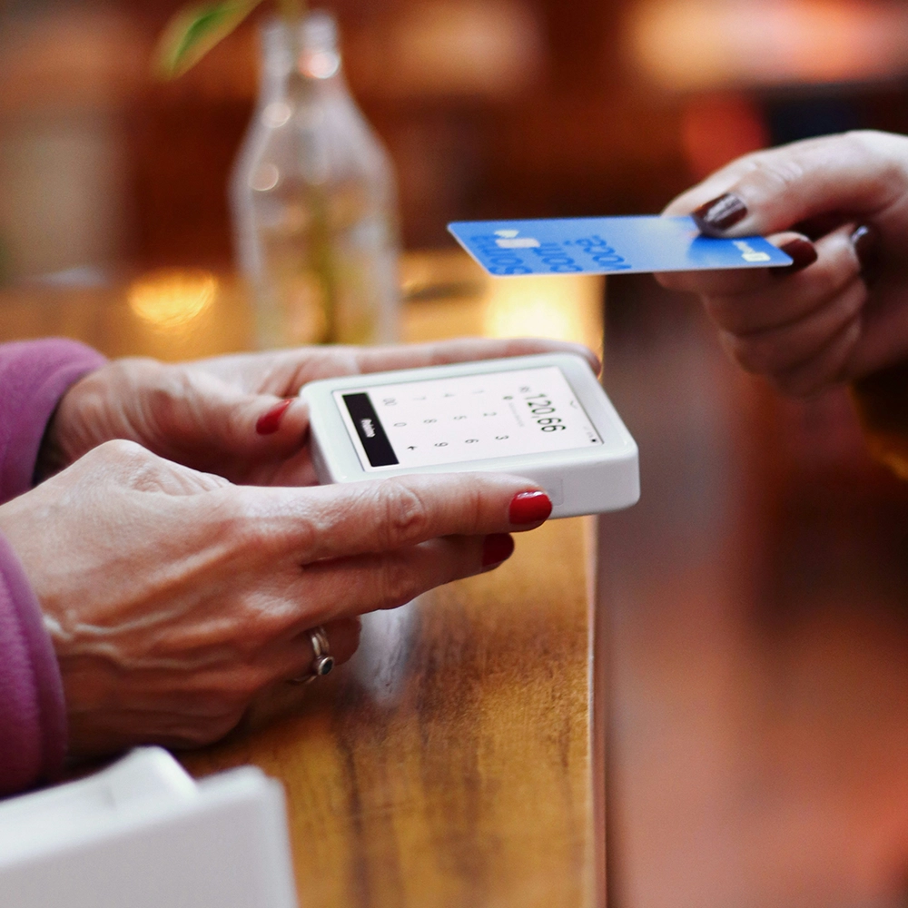 Traveler using a credit card payment method.