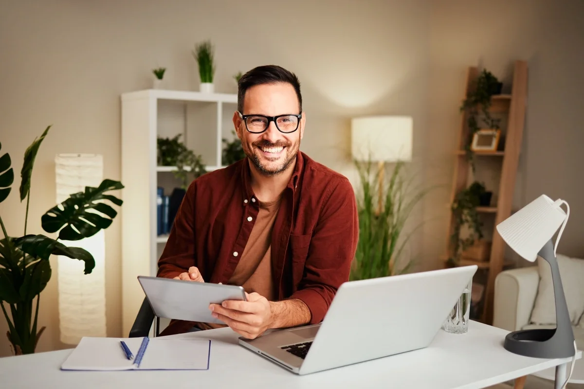 Finance representative smiling at desk