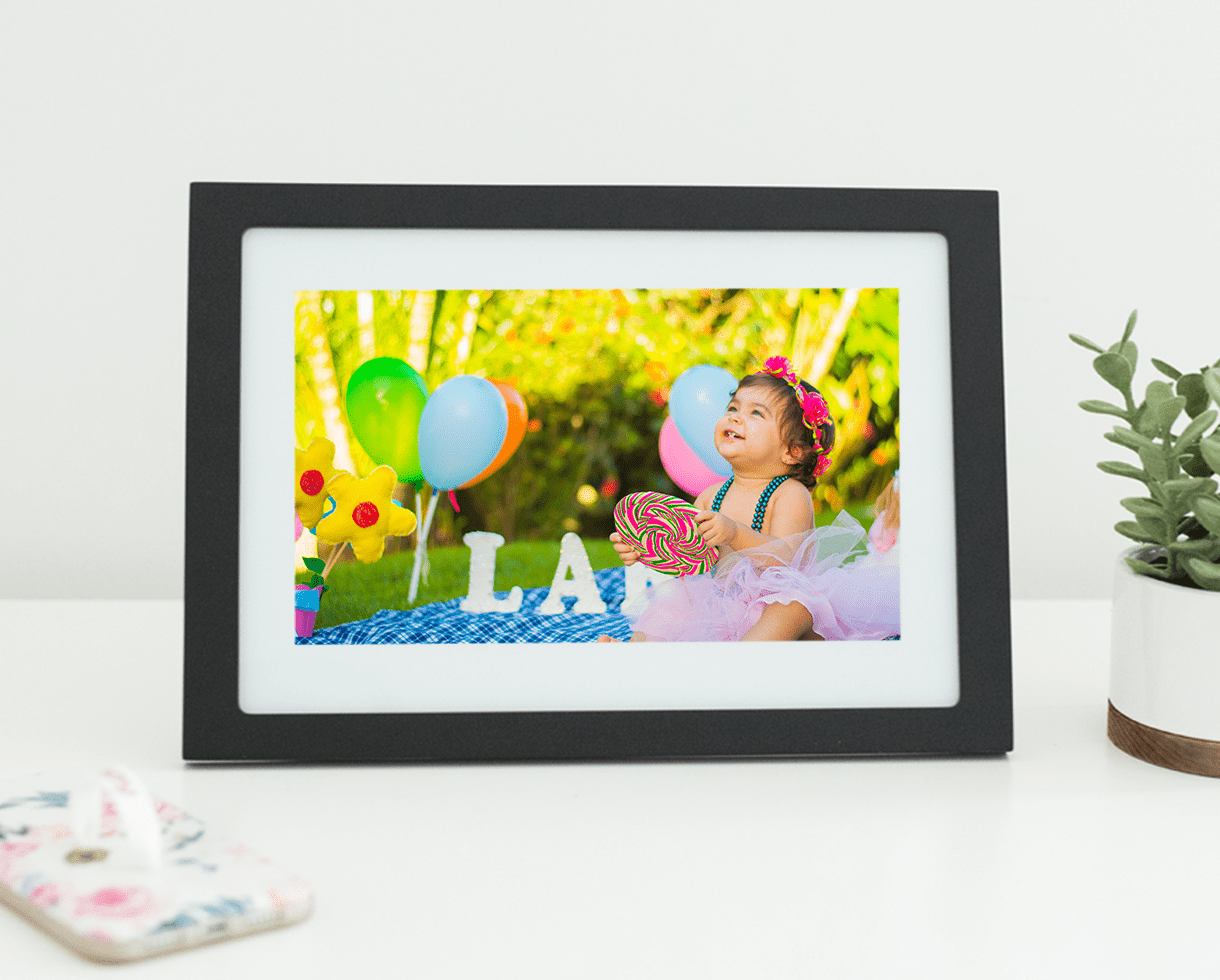 Image of a child's birthday party on a digital photo frame