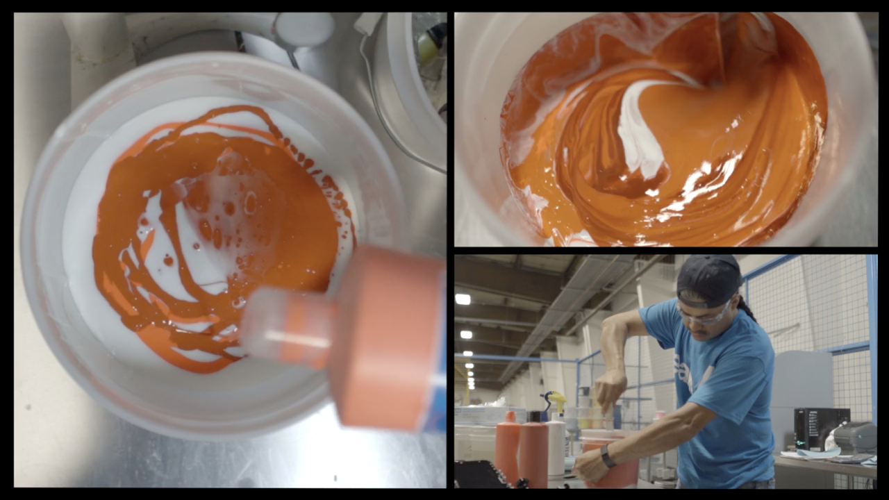 A screen printer mixing ink.