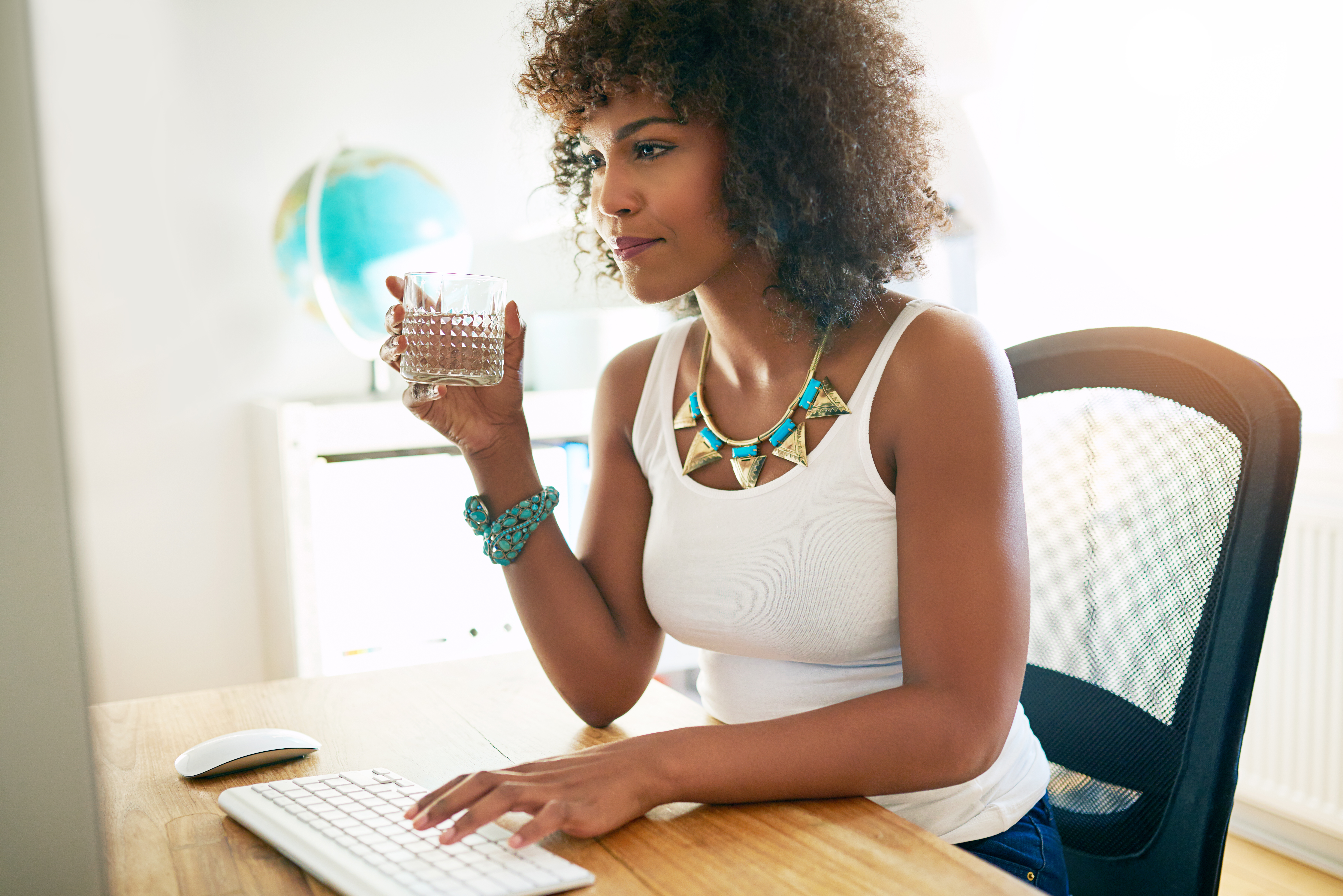 jewelry business woman sitting at her computer