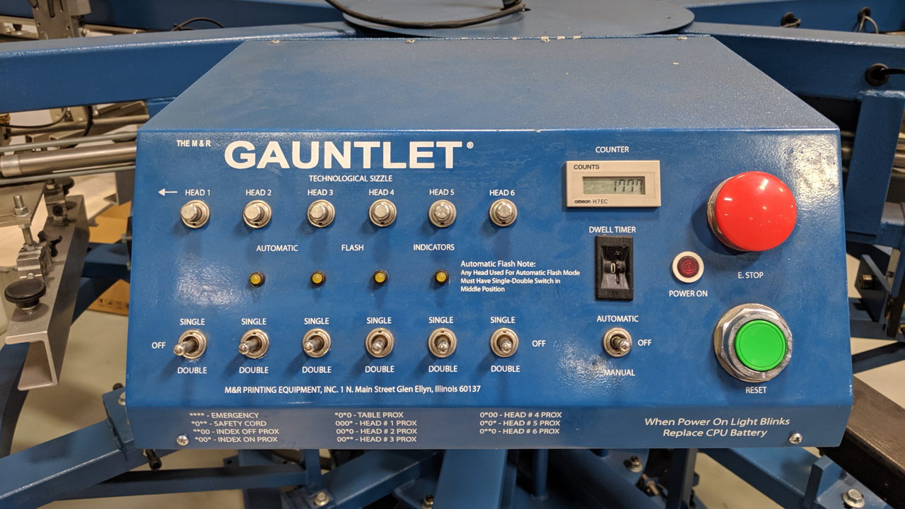 The control panel for an M&R Gauntlet screen printing press