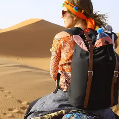 Woman traveling with a backpack.