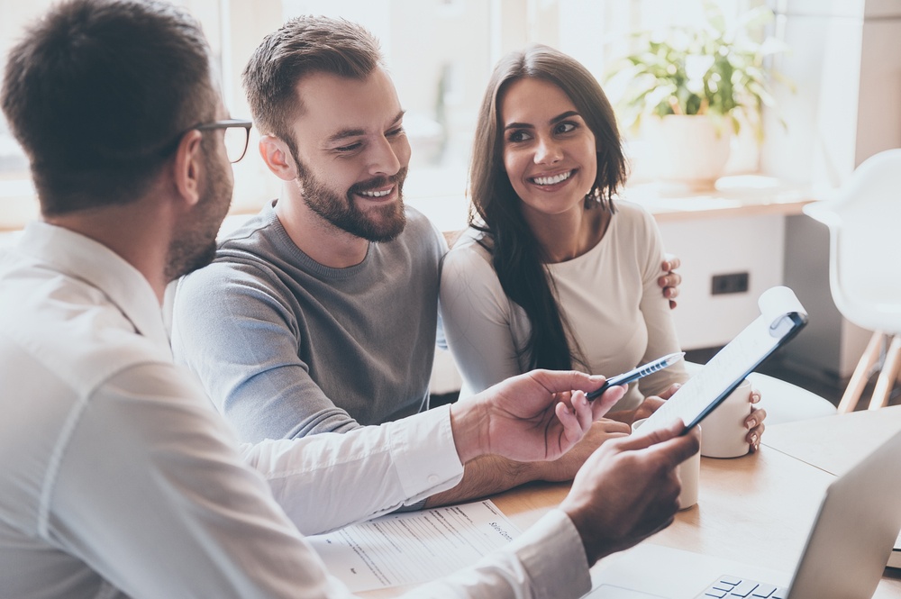 couple speaking to a mortgage adviser