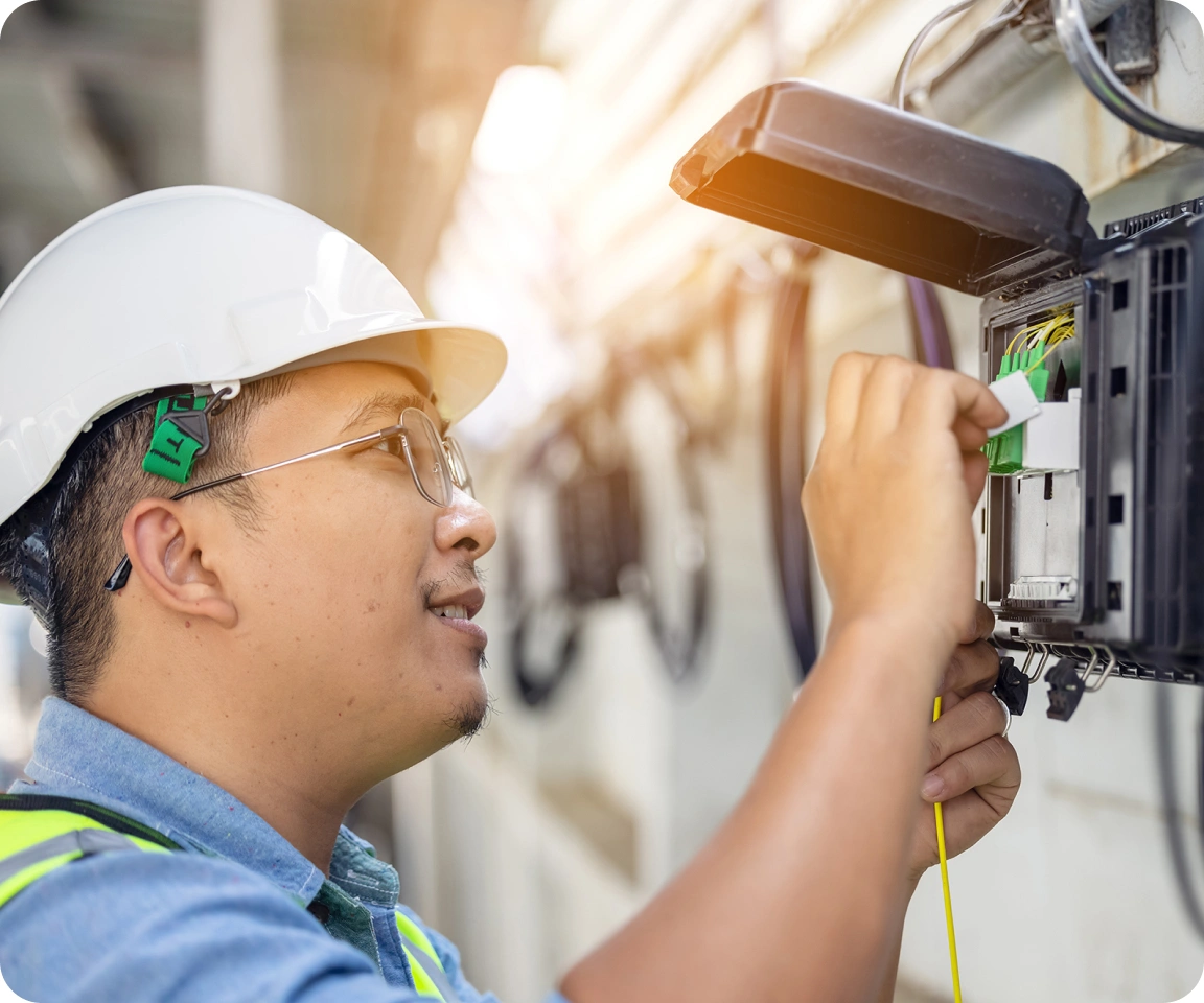 engineer connecting cables