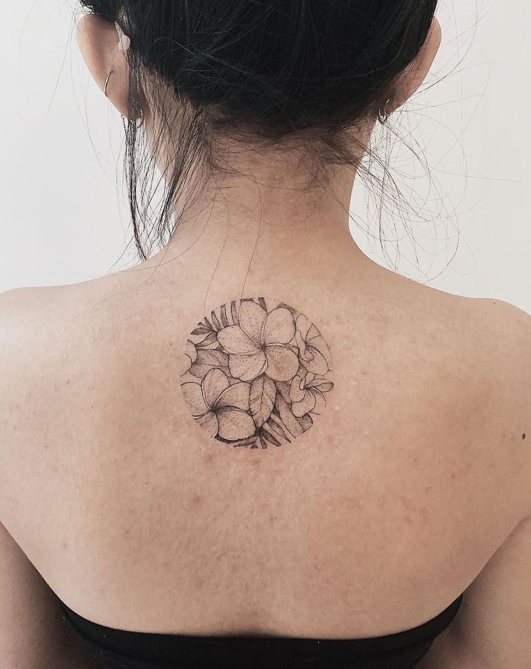 Plumeria tattoo in dotwork