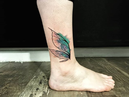 heart with wings tattoos on ankle