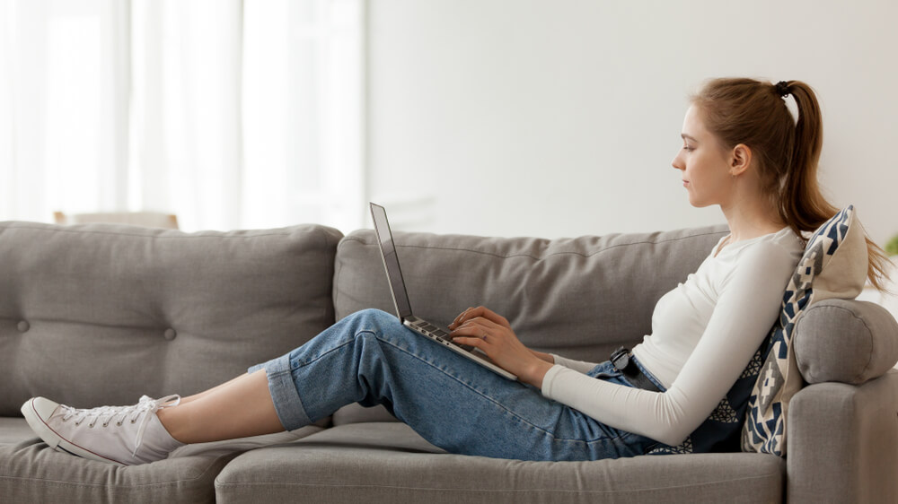 young woman applying for a secured loan online