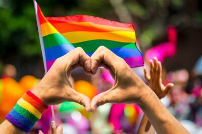 photo-heart-hands-and-pride-flag-400x265.jpg