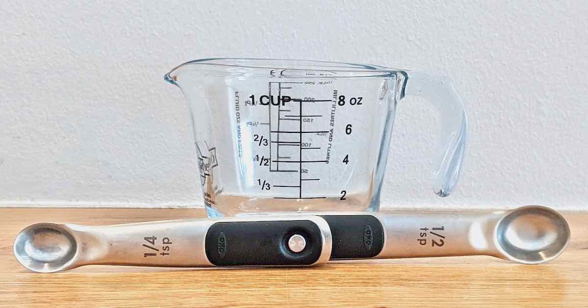 A measuring cup and measuring spoons