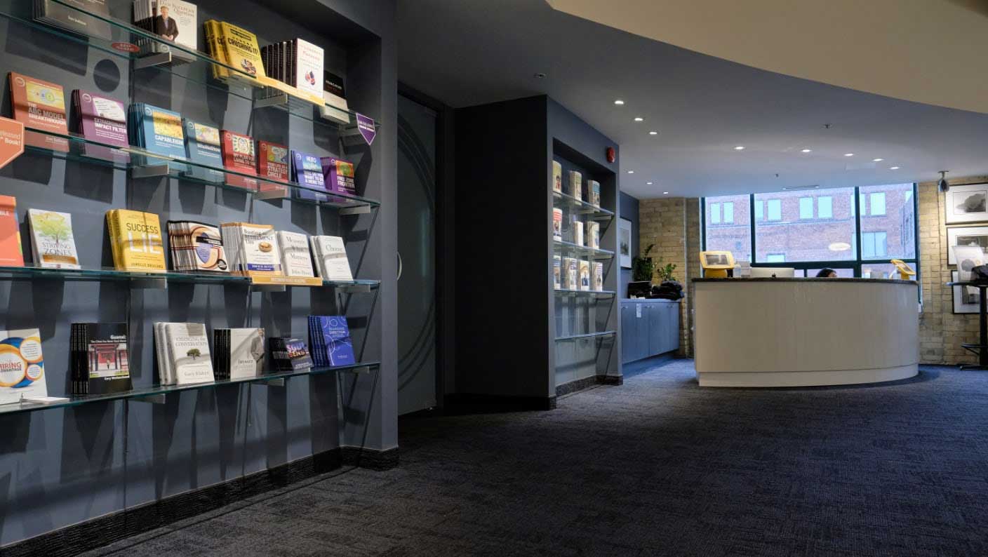 Strategic Coach Members lounge in Toronto Office with Knowledge Product books.