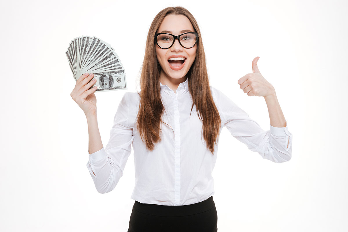 Happy woman with payday loan cash