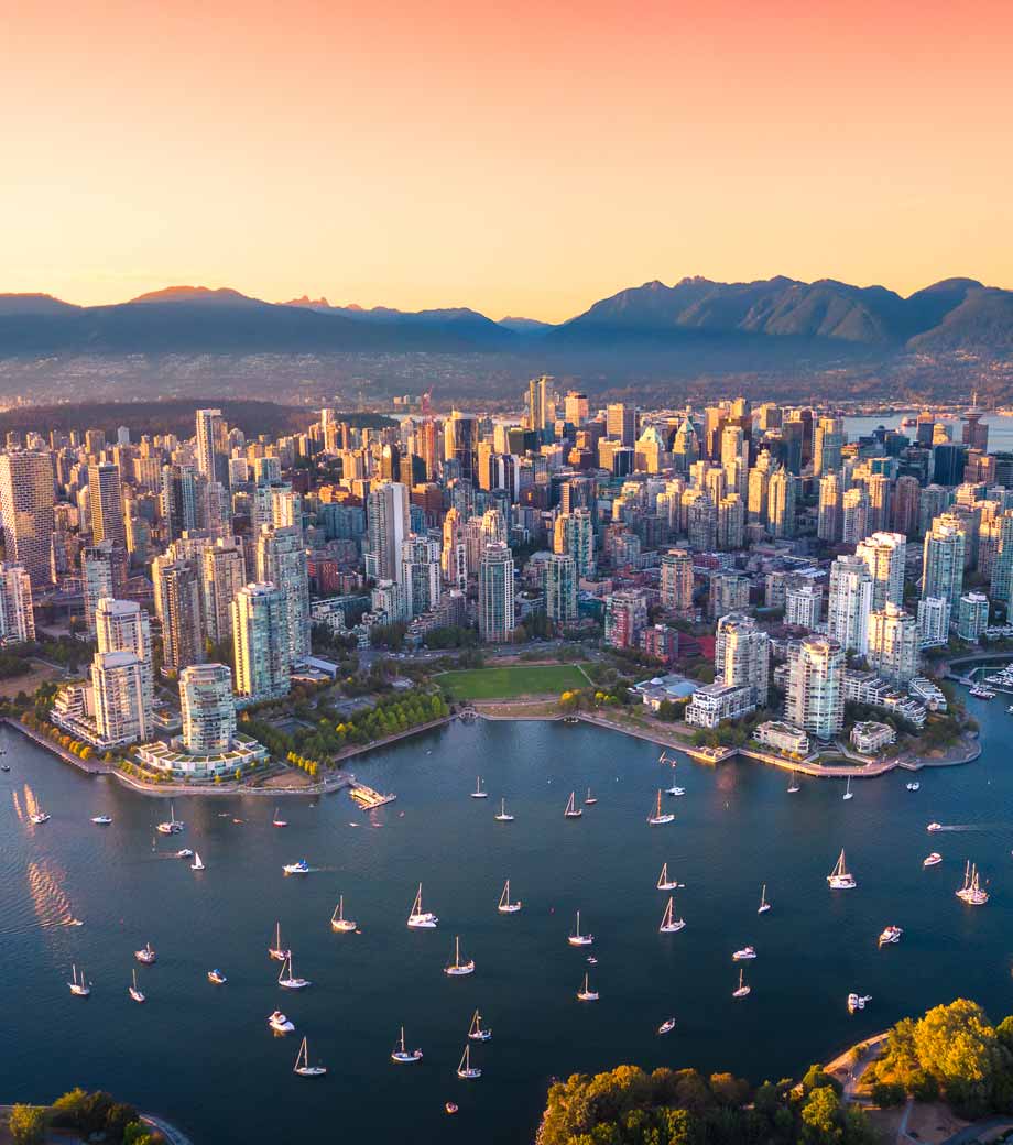 Aerial view of the downtown skyline and Stanley Park in Vancouver