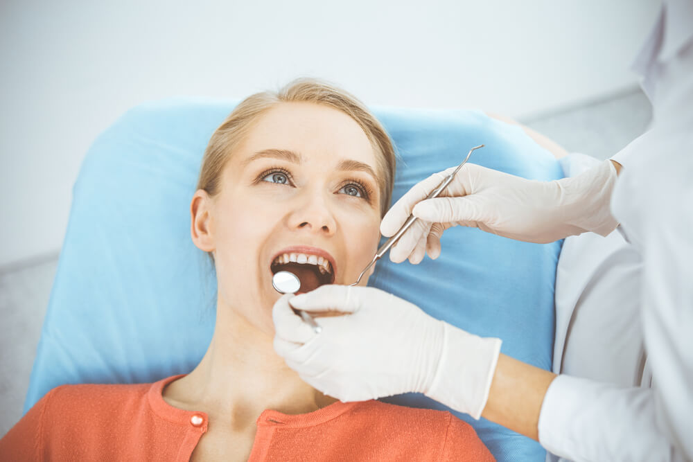 dentist evaluating dental work costs
