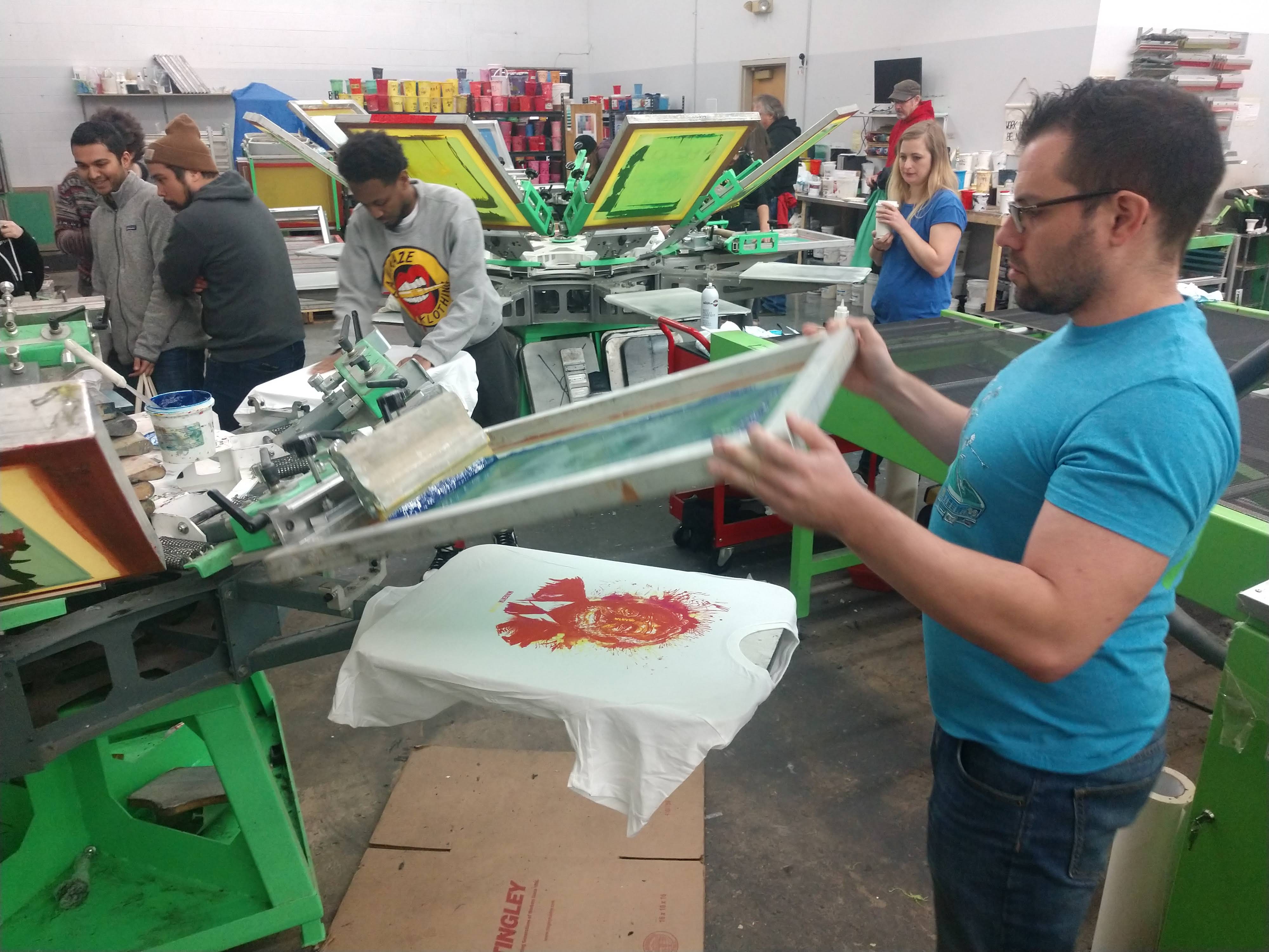 Steve Leichman, Printavo onboarding expert, tries his hand at CMYK screen printing