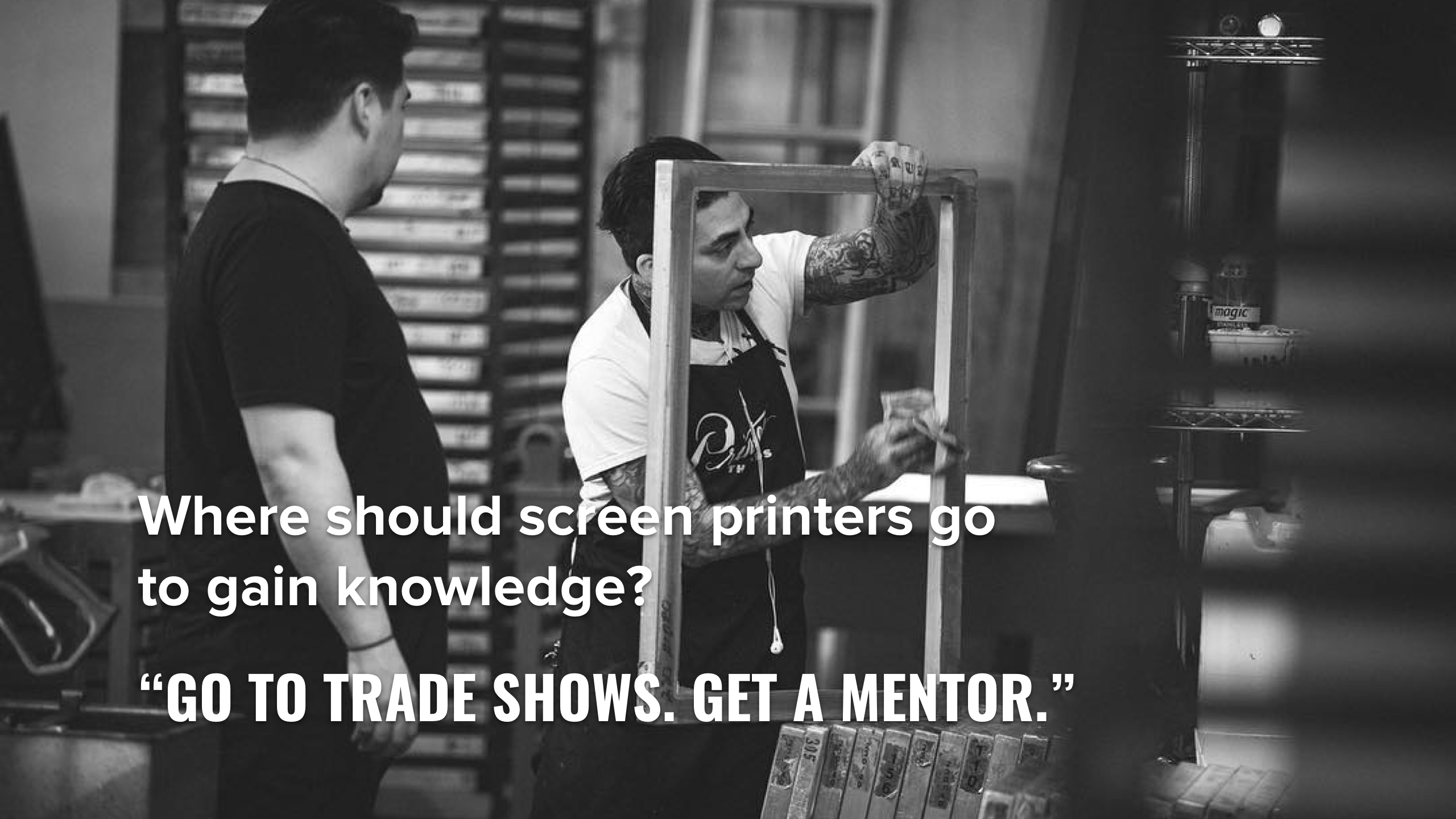 A screen technician checks a screen printing screen.