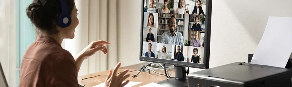 woman in online meeting in home office