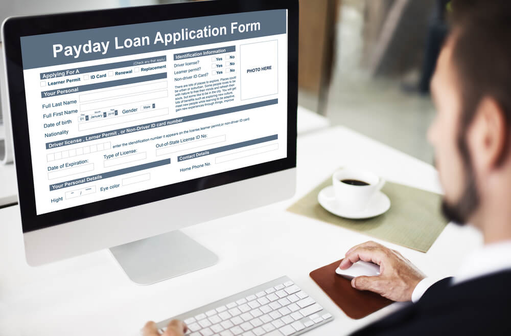 Man applying for online payday loans in KY