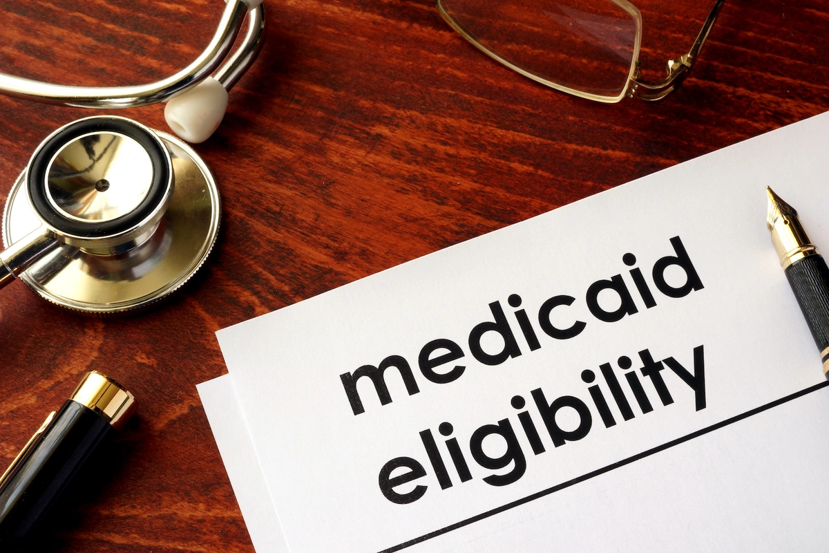 medicare savings program medicaid eligibility on clipboard