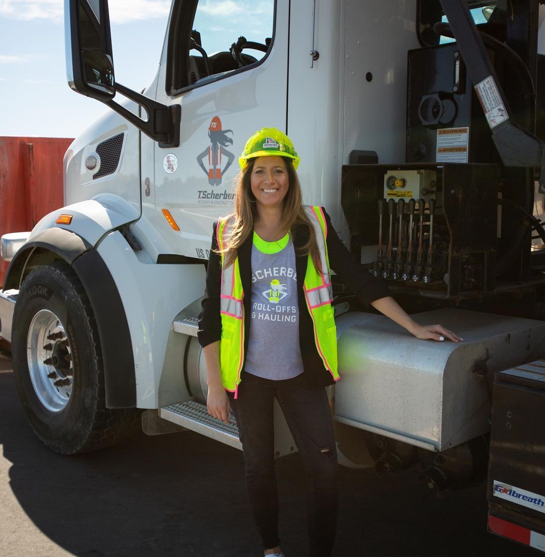 Missy Scherber in front of a truck