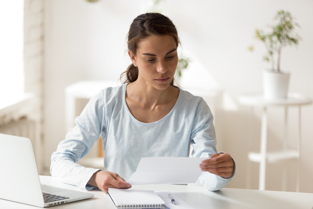 woman looking at documents