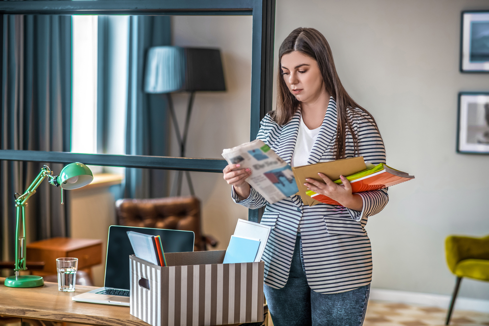 woman filing at home