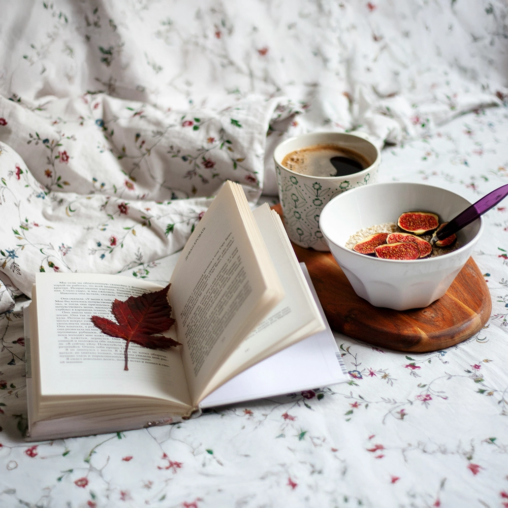Cozy breakfast with a book.webp