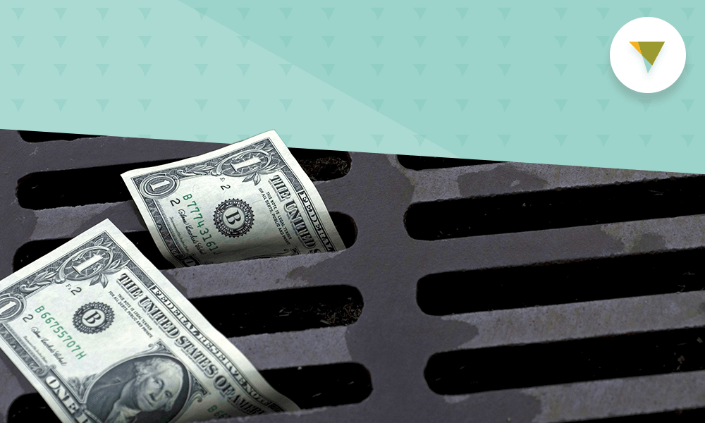 Money falling through storm drain