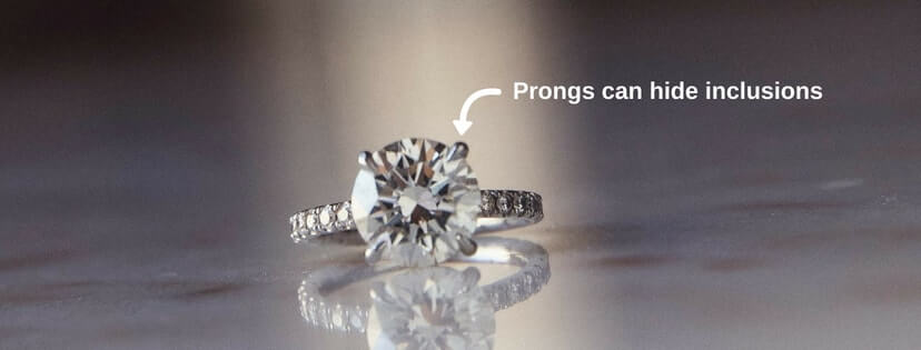 engagement ring prongs hiding an inclusion