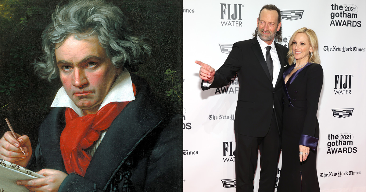 On the left, a painting of a man with wild grey hair and furrowed brow in a top coat over a red scarf and collared shirt. He looks up from the sheet music he writes on. On the right, a tall man and petite blonde woman at the 2021 Gotham Awards, clad