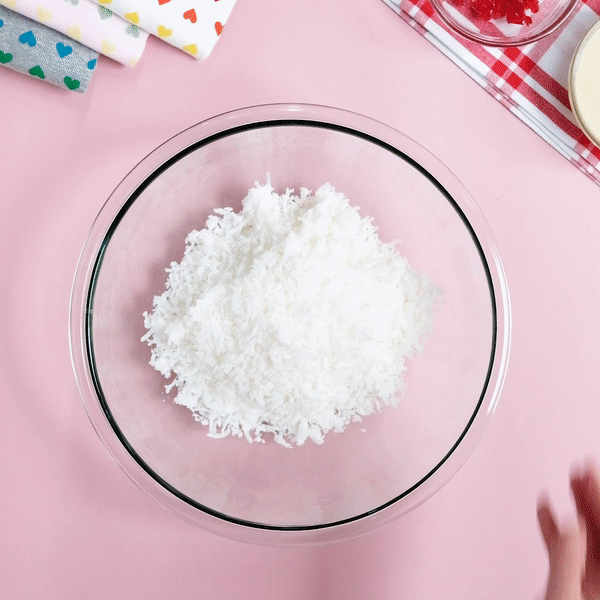 mixing condensed milk and shredded coconut gif