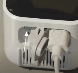 A close-up of a white deviceAI-generated content may be incorrect.