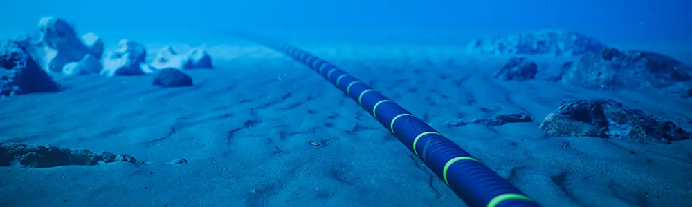 Underwater Fiber Optic Cable On Ocean Floor