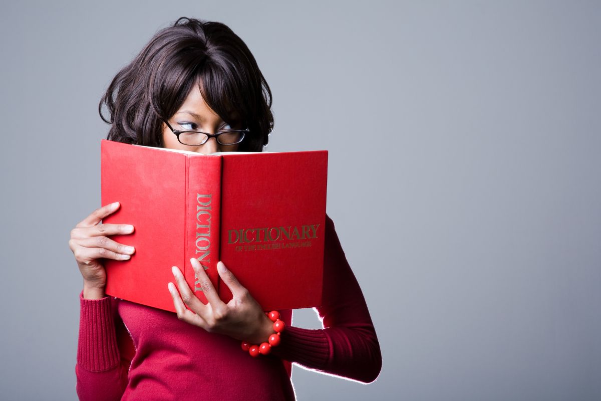 woman holding the Medicare glossary