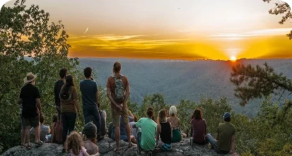 travellers enjoying a sunrise