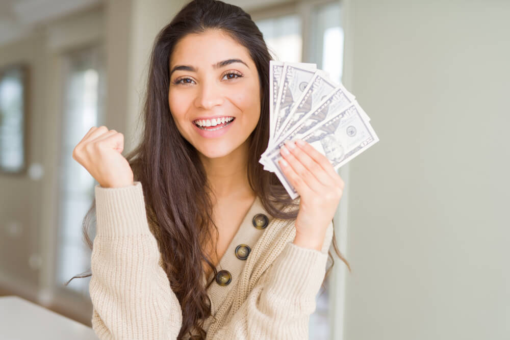 Woman happy about title loan cash