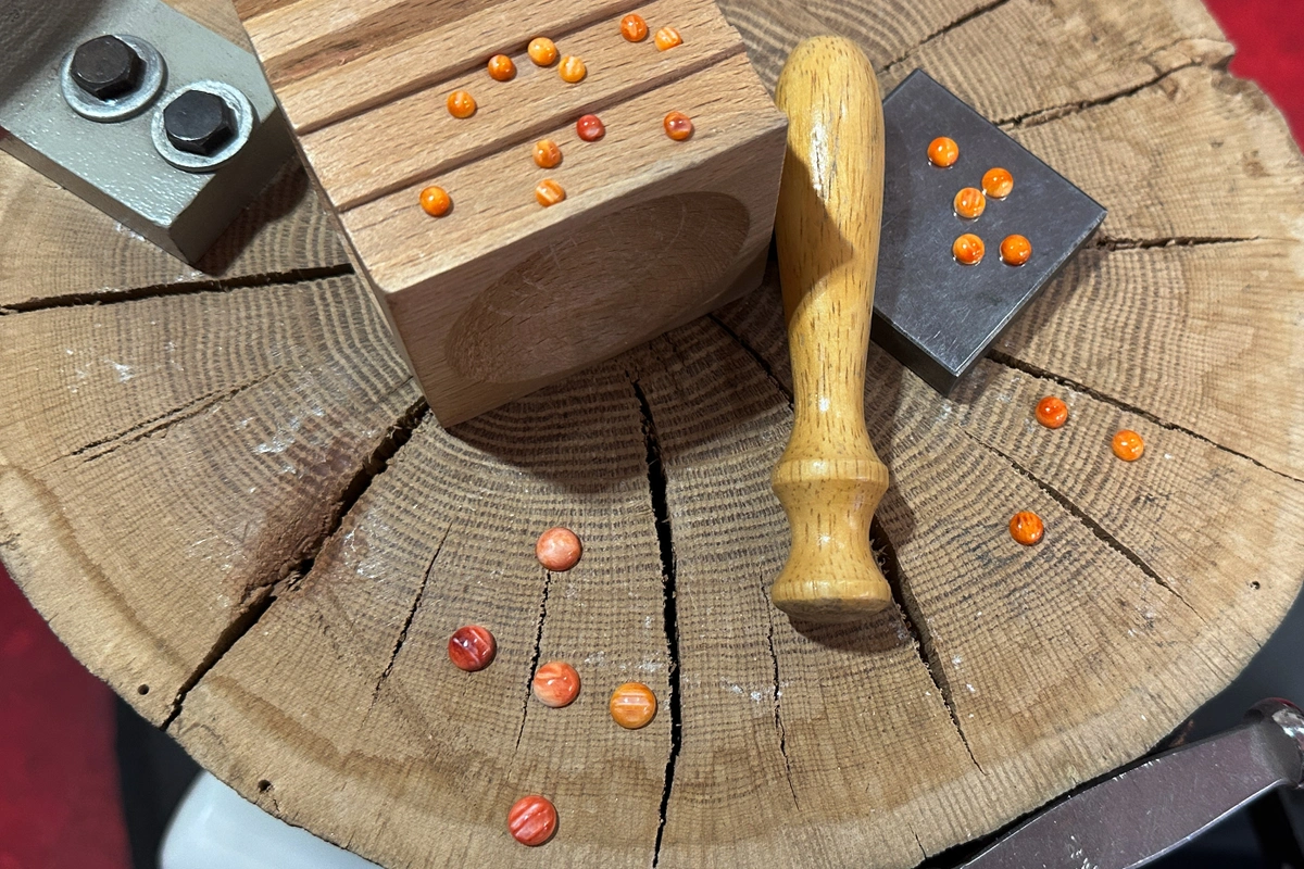 Assorted spiny oyster cabs on wooden dapping block