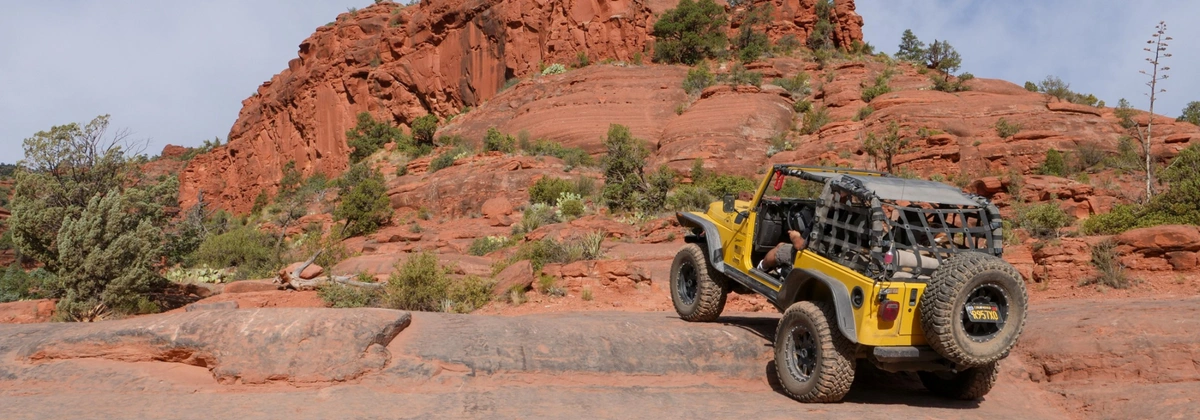 Jeep Wrangler going up Red Rock on Broken Arrow in Sedona