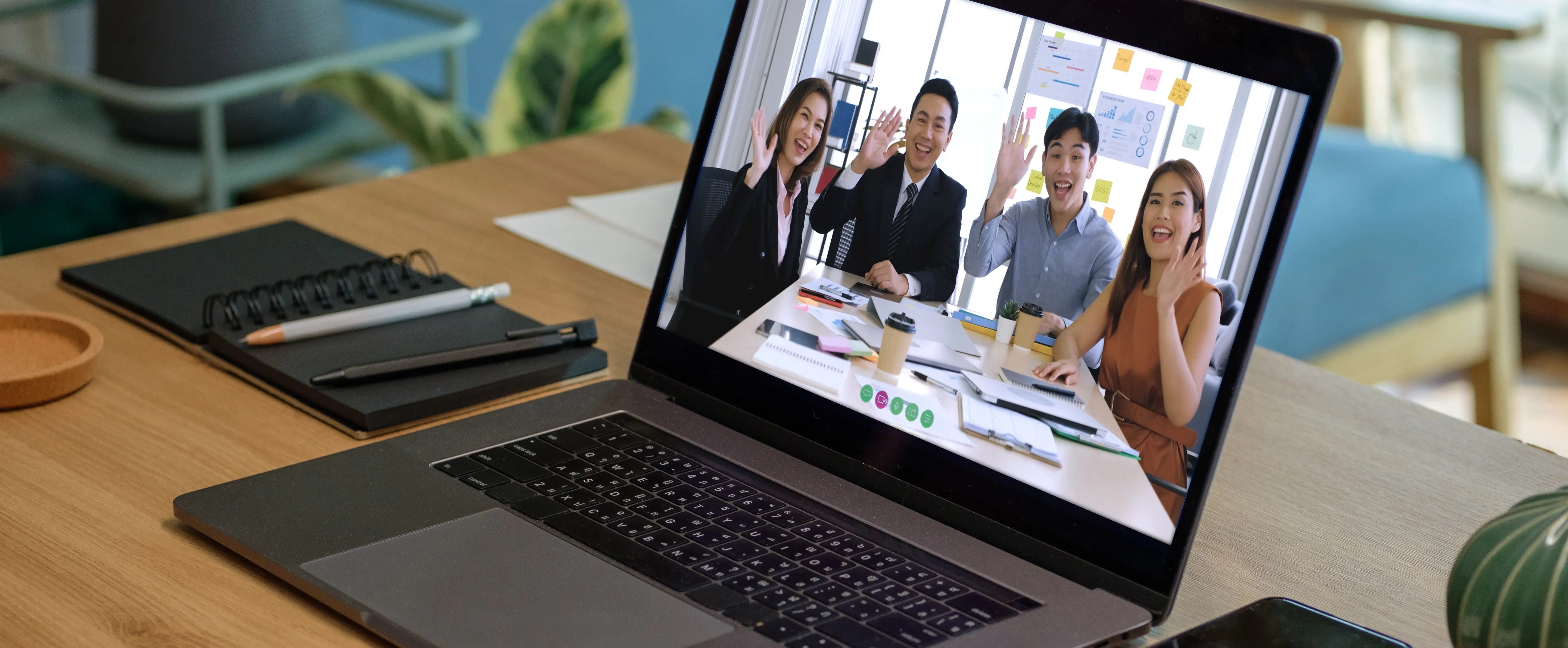 Remote team video conference on laptop screen