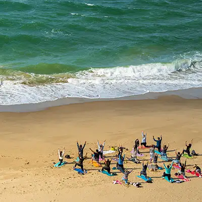 Group doing sunrise yoga.