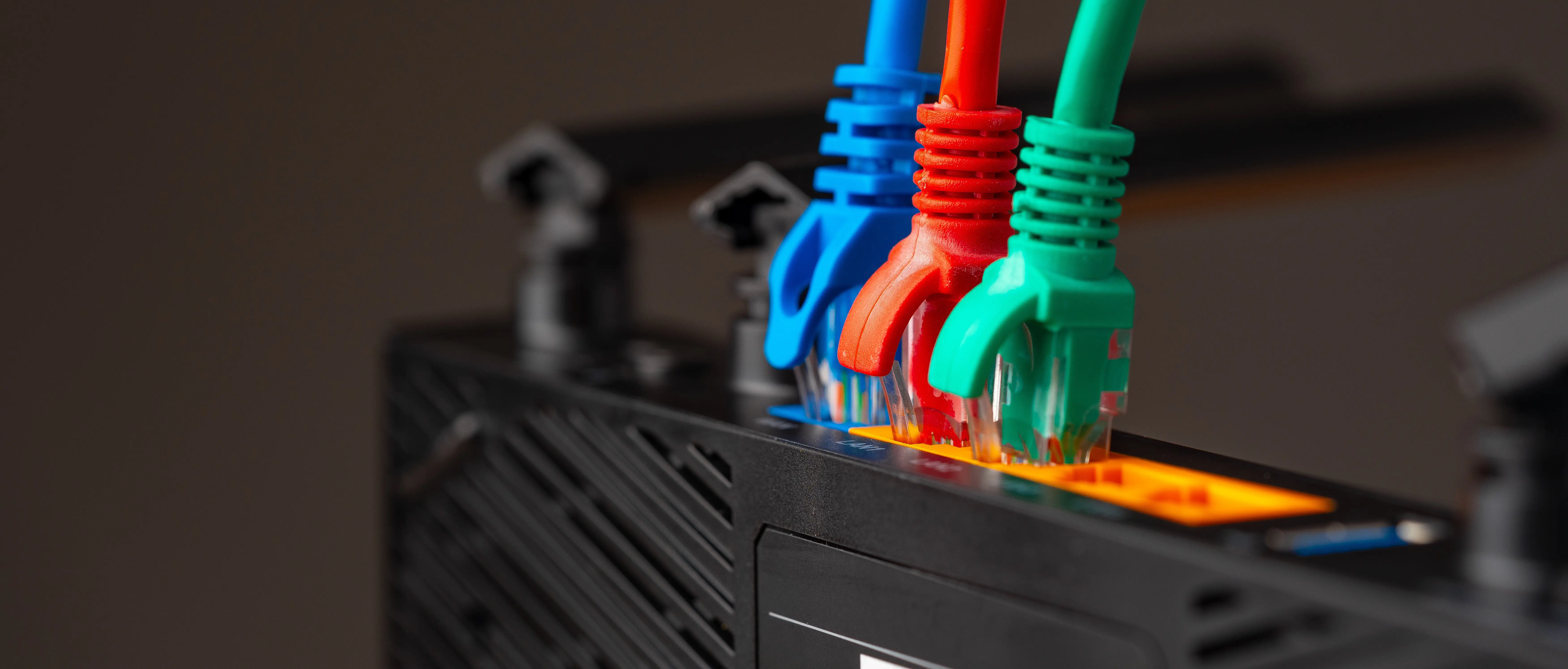 Home WiFi router with ethernet cables connected for reliable internet setup