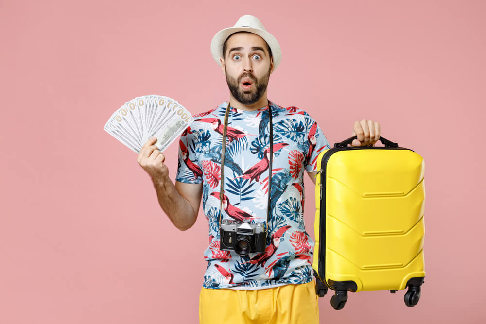 man with vacation title cash