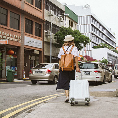 Woman traveling through a city solo.