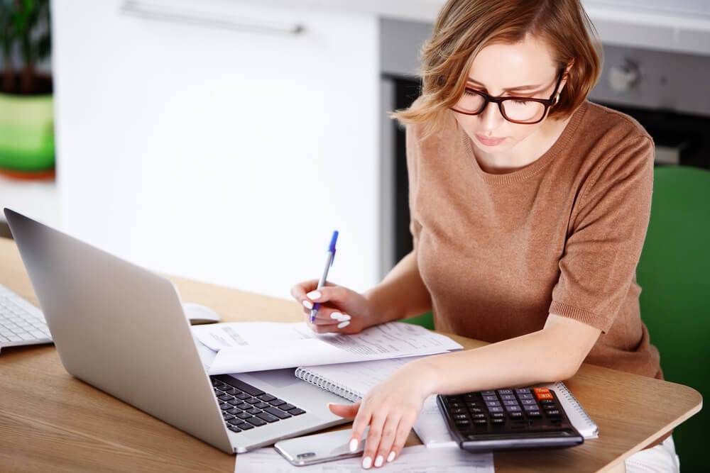 woman managing end of year budget