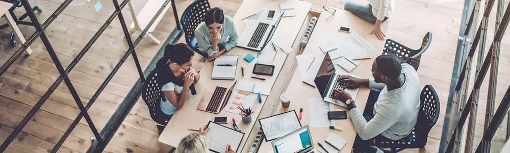 overhead shot of people in a conference room