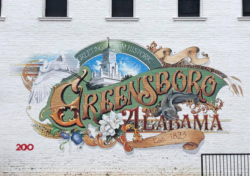 Greetings from Greensboro mural by Donald Walker in Greensboro, Alabama