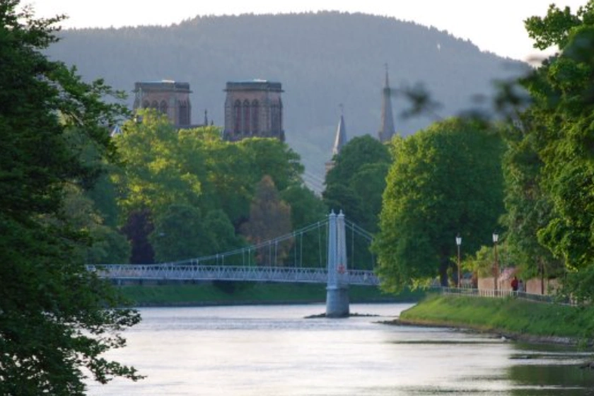 River and bridge with lots of trees