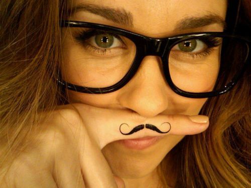 finger mustache tattoo