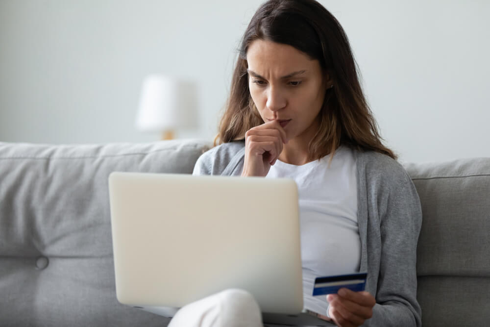 Woman wondering if she can go over her credit limit and what will happen if she does